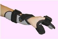 Holds hand in position with thumb in opposition. Thumb position adjustable. Thick padding over wrist. Removable finger separator.